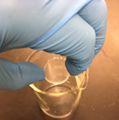 Wear gloves and clean IR plates over a waste beaker