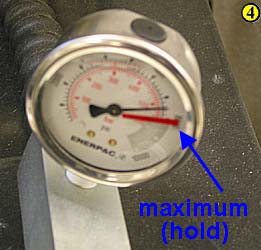 4. Continue pumping the handle until you reach the maximum mark on the dial.