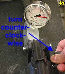 5. Hold the pressure for a minute or so, and then gently release it by turning the pressure-release knob no more than 1/4 turn counter-clockwise.