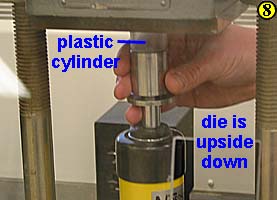 8. To release your pellet from the die, place a cylindrical plastic piece on top of C, and gently apply pressure to force the pellets and paper/KBr disc out.